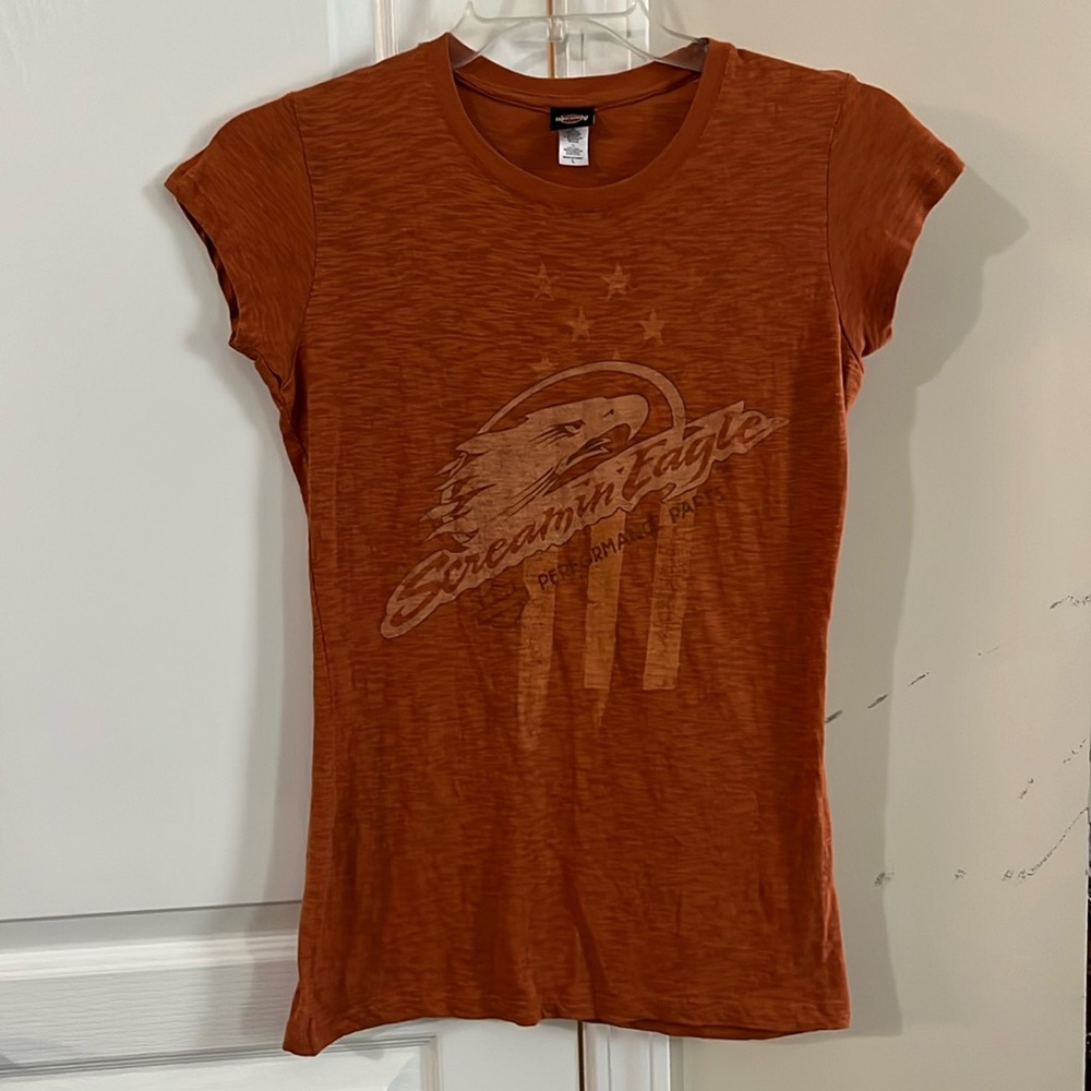 Harley Davidson women’s size large orange Screamin’ Eagle T-shirt